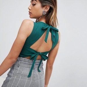 FashionUnion sleeveless bodysuit with bow tie back